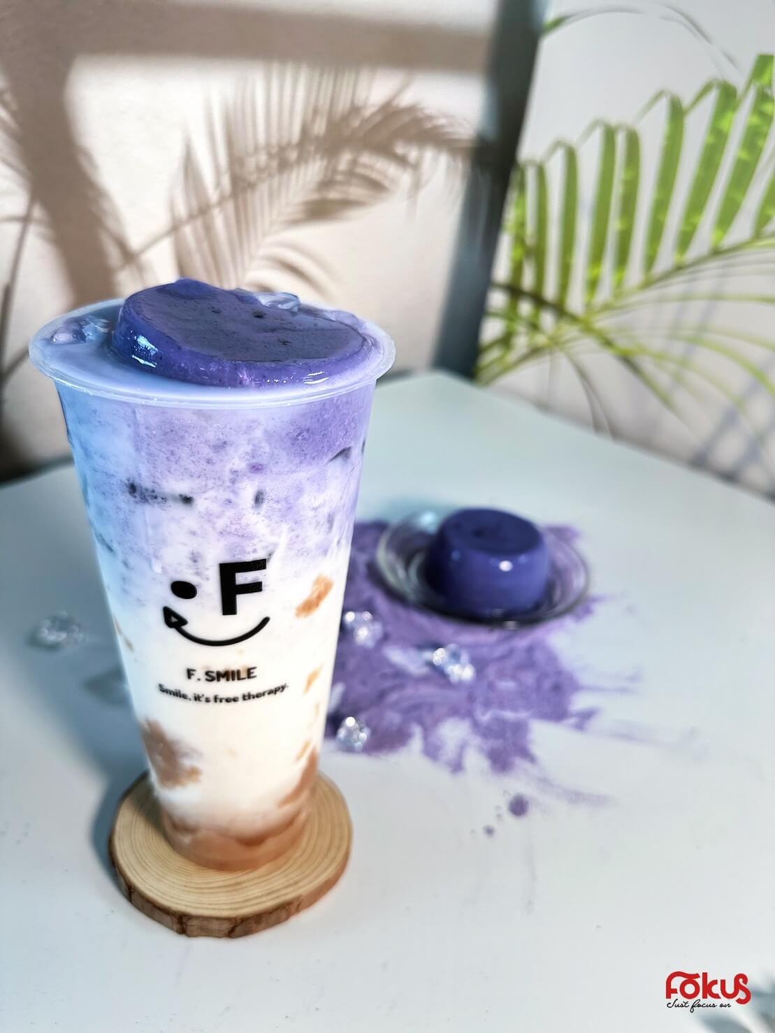 Enchanting Taro Milk Tea Topped with Cream and Purple Taro Cubes